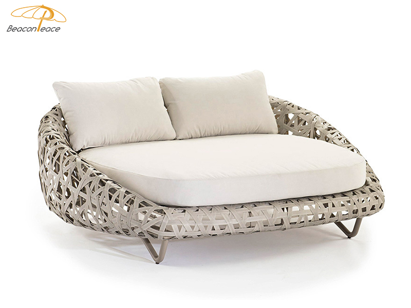 Outdoor sofa with cushions